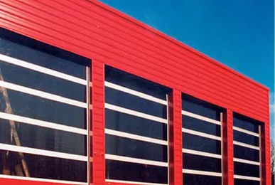 Installation et pose de portes sectionnelles pour locaux industriels et ateliers en Bretagne